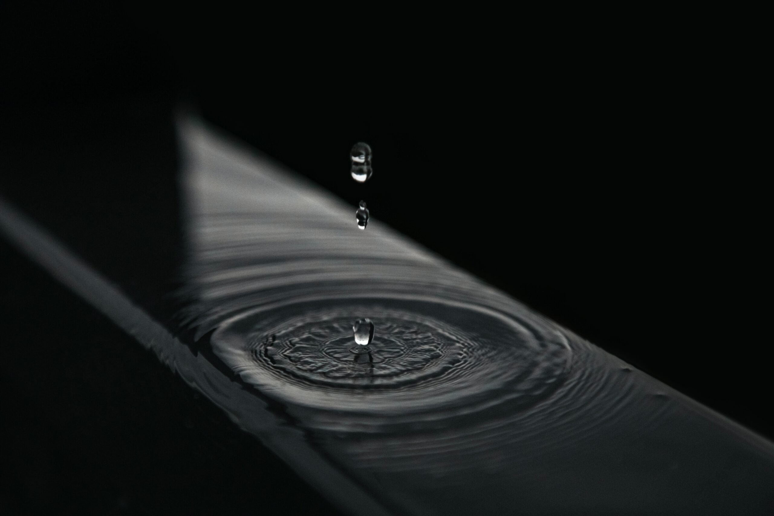 Depicts water drops falling into a pool of water and causing ripples. Used as a cover image for a news article on Republic launching their secondary market in beta.