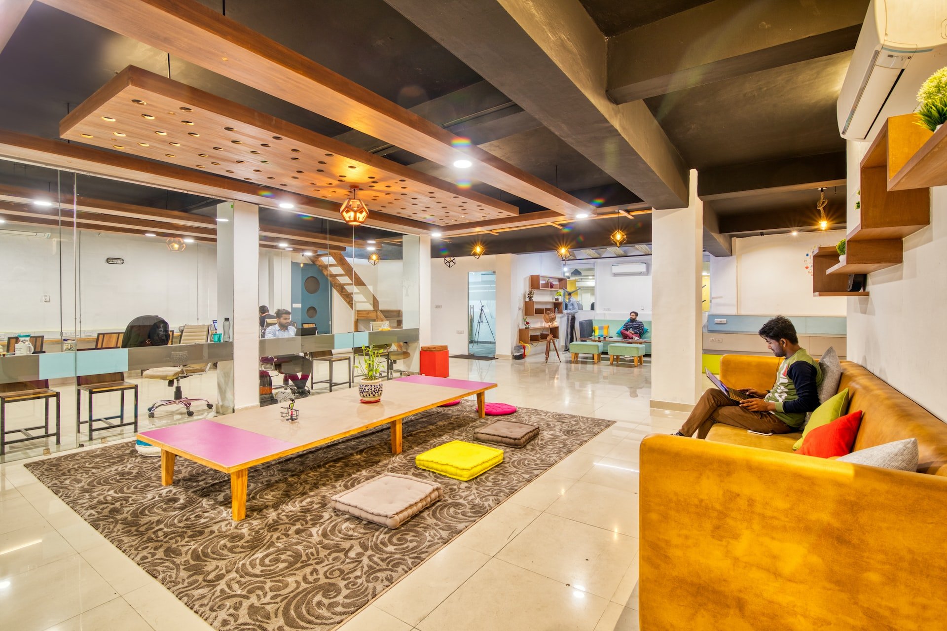 Depicts an office setting, representing investments in startup companies.